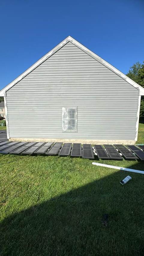 A gray exterior gable photographed on site.